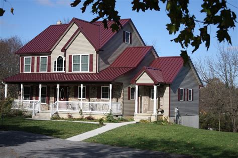 red metal roof house with blue door|red roof interior design.